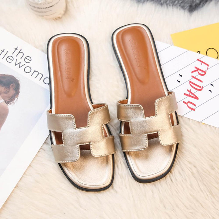 Sandales Eloria femme, confortables et stylées, parfaites pour l'été et le quotidien.