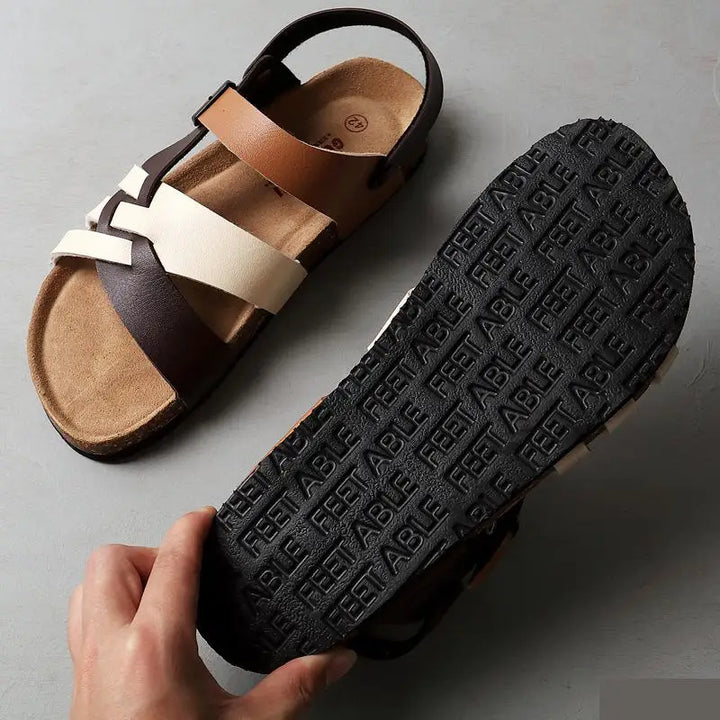 "Sandales en cuir premium, orthopédiques, design élégant et ergonomique, pour un confort et style optimal au quotidien."