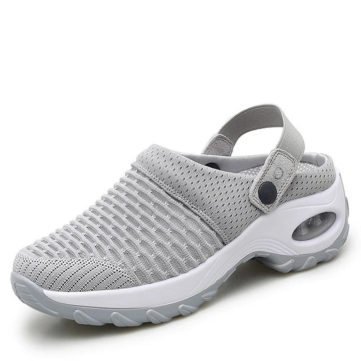 Sandales légères et confortables pour femmes. Soutien voûte plantaire, design moderne. Disponibles en noir et gris.