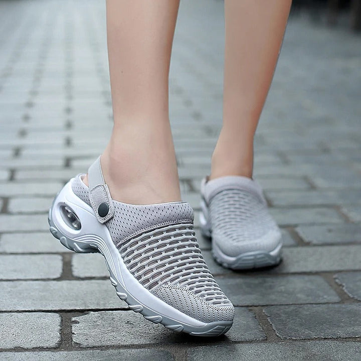 Sandales femmes légères avec soutien voûte plantaire ergonomique pour confort durable. Chaussures ajustables.