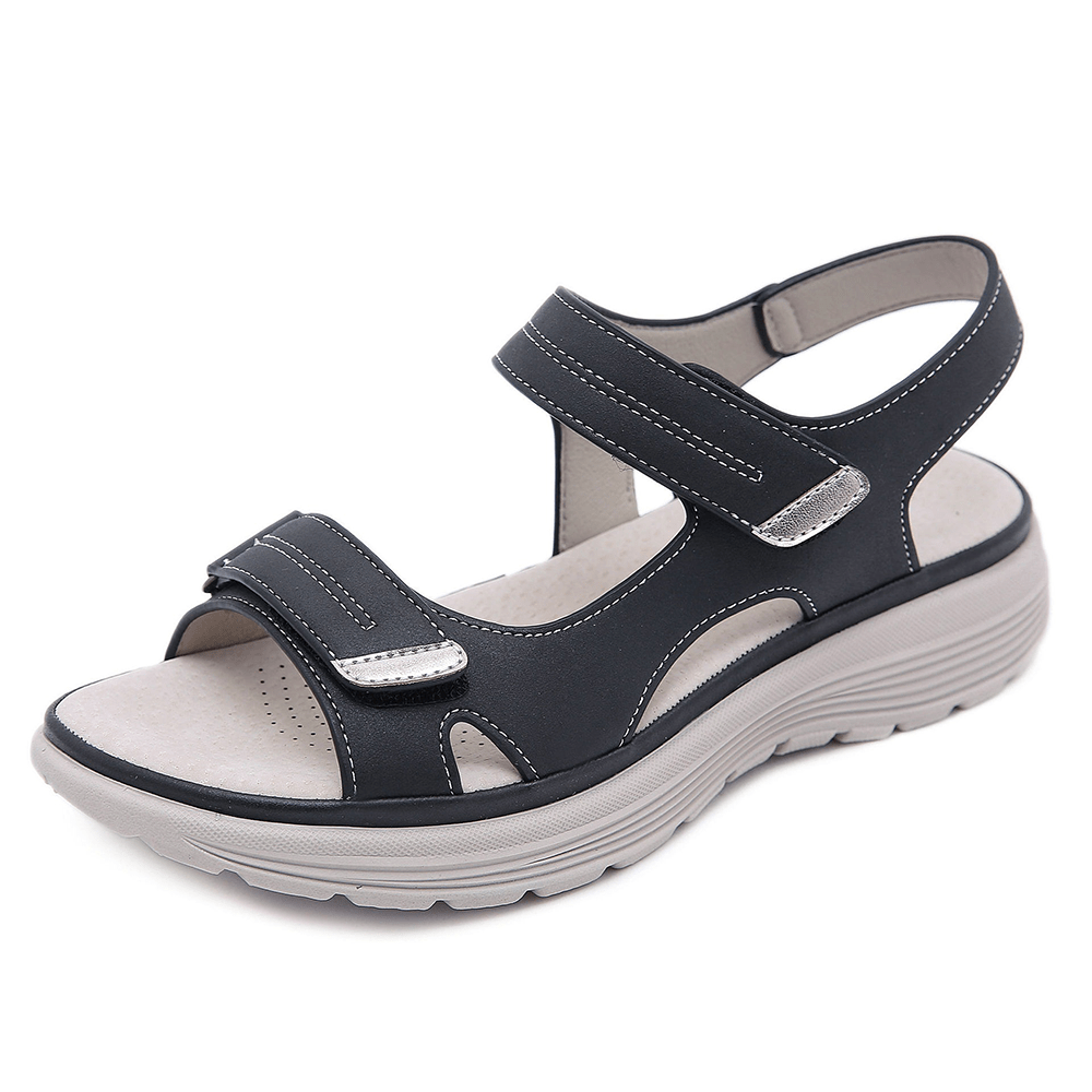 Vue latérale des sandales orthopédiques femme, avec semelle ergonomique et soutien optimal pour le confort estival.