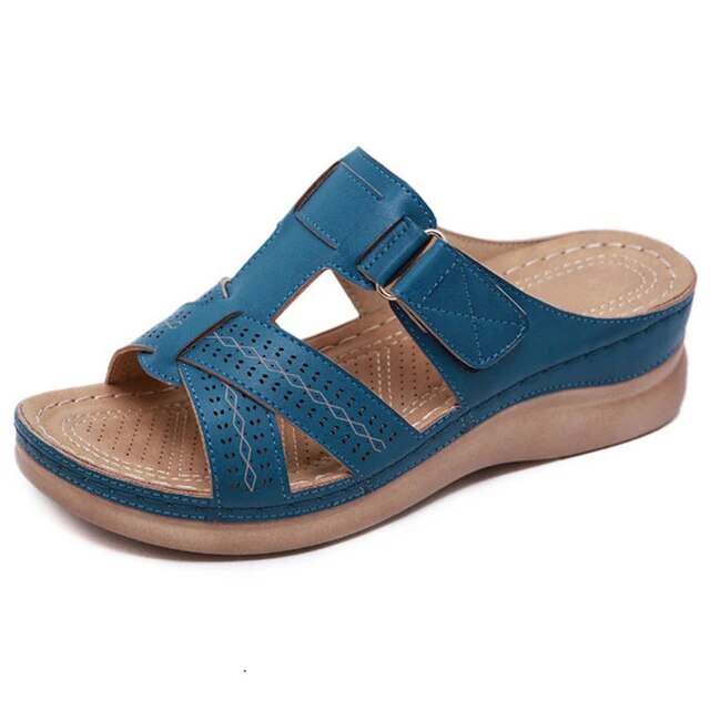 "Sandales orthopédiques ComfortWave en bleu, offrant soutien plantaire et confort optimal pour une meilleure posture."