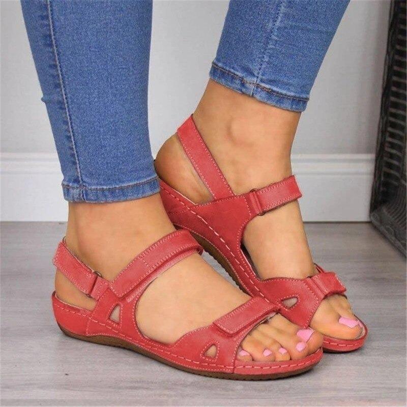 Sandales orthopédiques élégantes pour femmes avec soutien, brides réglables et matériaux respirants, idéales pour le confort.