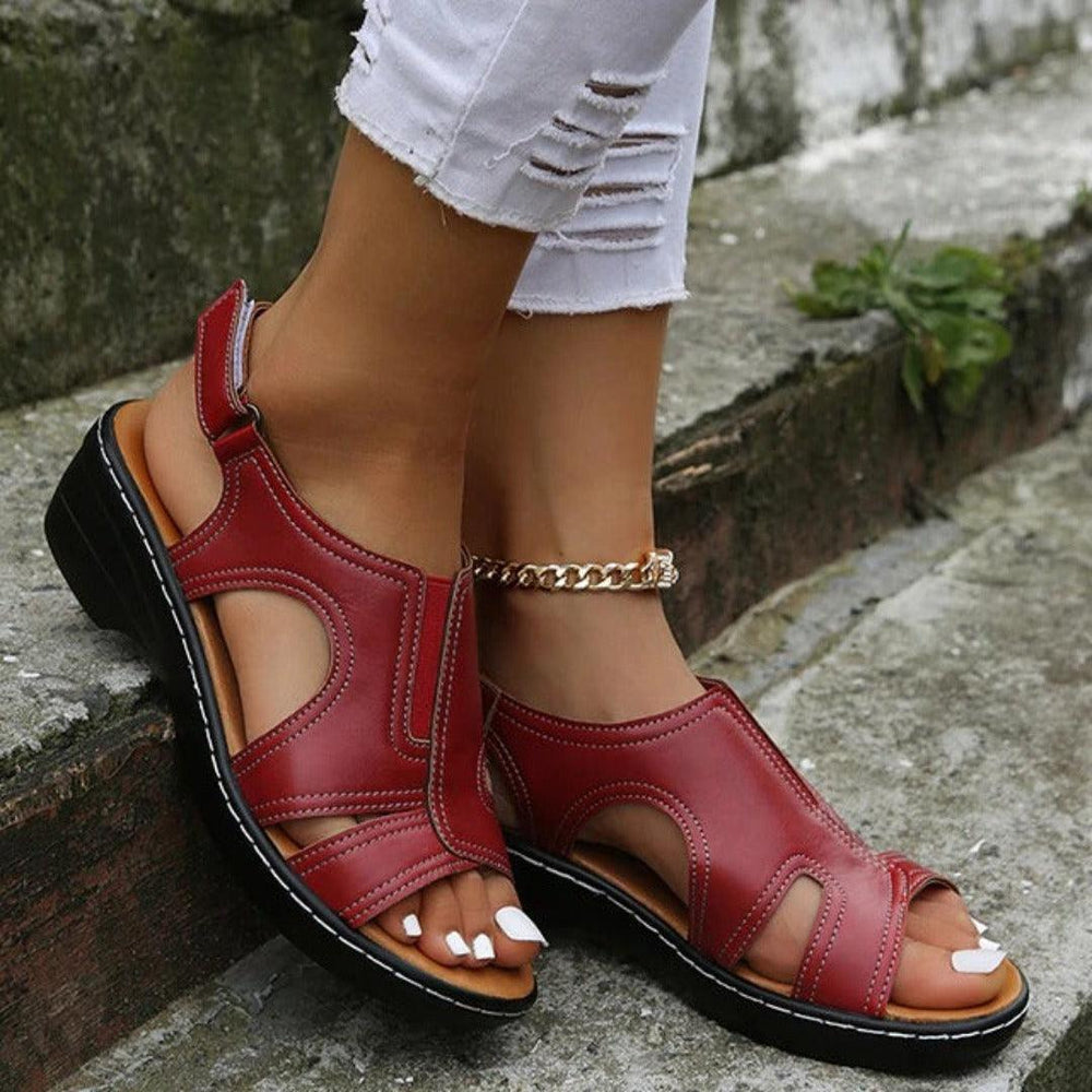 "Sandales orthopédiques femmes bleu marine, confort et soutien voûte plantaire, style moderne, semelle amortissante."