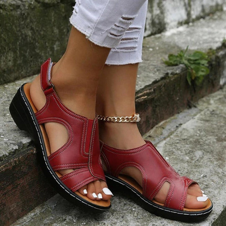 "Sandales orthopédiques femmes bleu marine, confort et soutien voûte plantaire, style moderne, semelle amortissante."