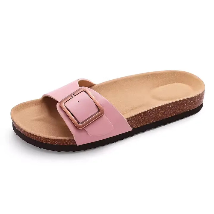 Sandales plates confortables pour femmes avec boucle simple, idéales pour l'été et le quotidien. Réglables.
