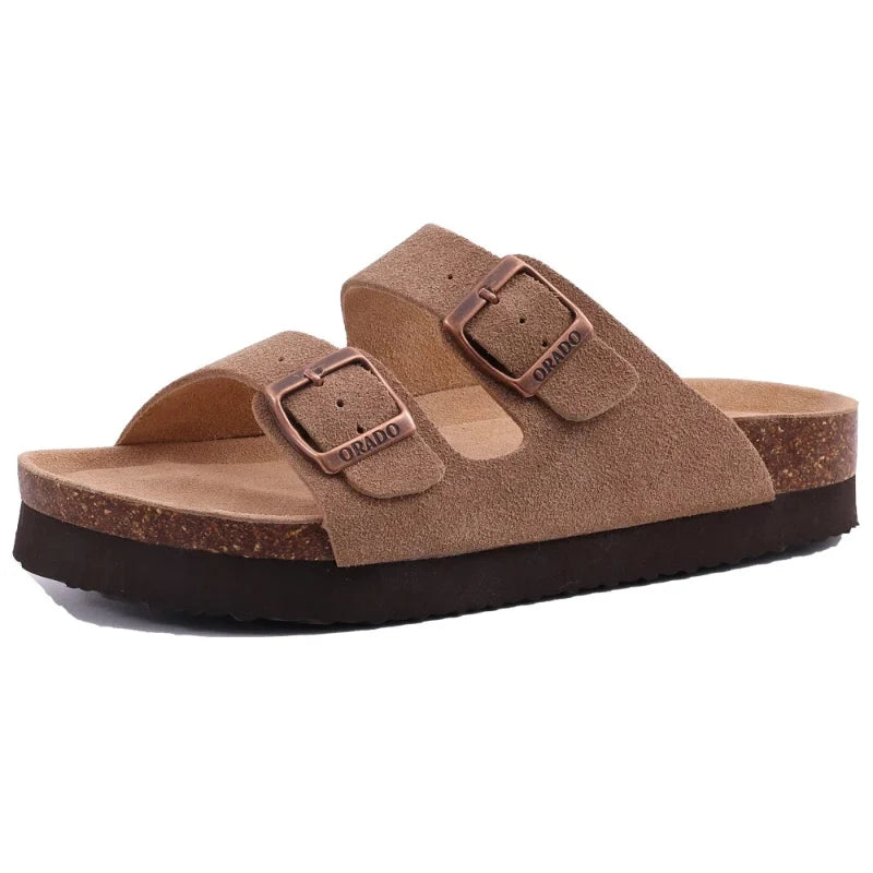 Sandales plates unixes noires confortables avec boucles réglables, idéales pour l'été et le quotidien.