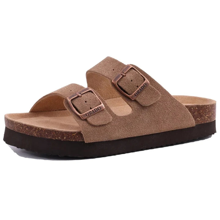 Sandales plates unixes noires confortables avec boucles réglables, idéales pour l'été et le quotidien.