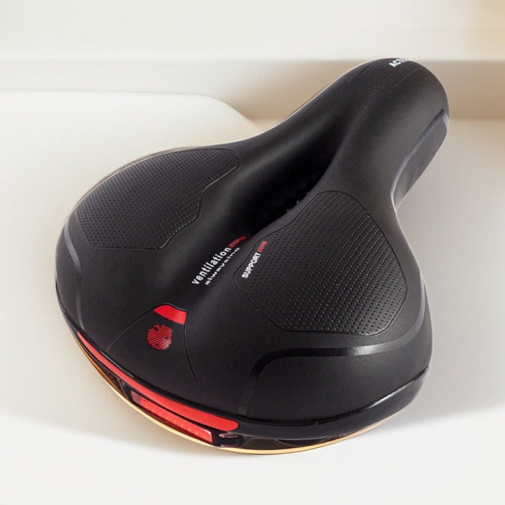 Selle vélo confort anti-douleur avec suspension. Design ergonomique, respirant, pour trajets agréables.