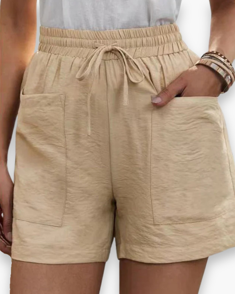 Short cargo estival pour femme, tissu léger, ceinture ajustable, poches pratiques, idéal pour un style décontracté.