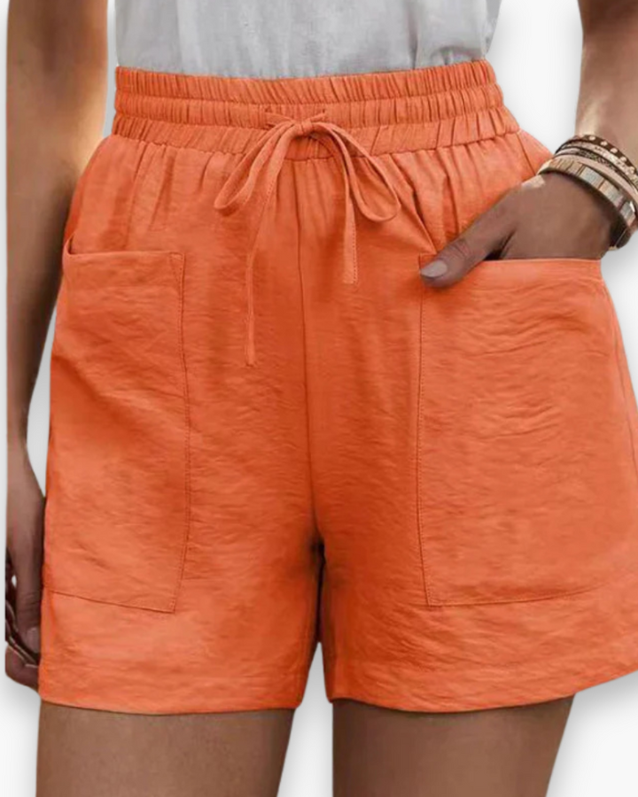 Short cargo estival pour femme, tissu léger, ceinture ajustable, poches pratiques, idéal pour un style décontracté.