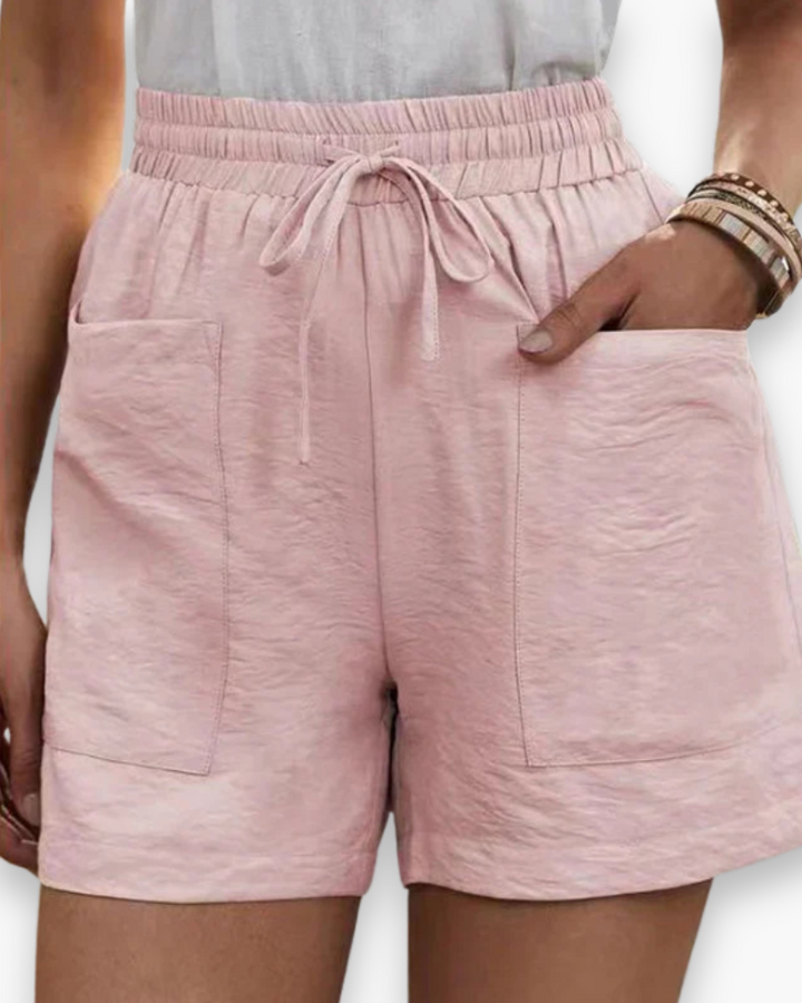 Short cargo estival pour femme, tissu léger, ceinture ajustable, poches pratiques, idéal pour un style décontracté.