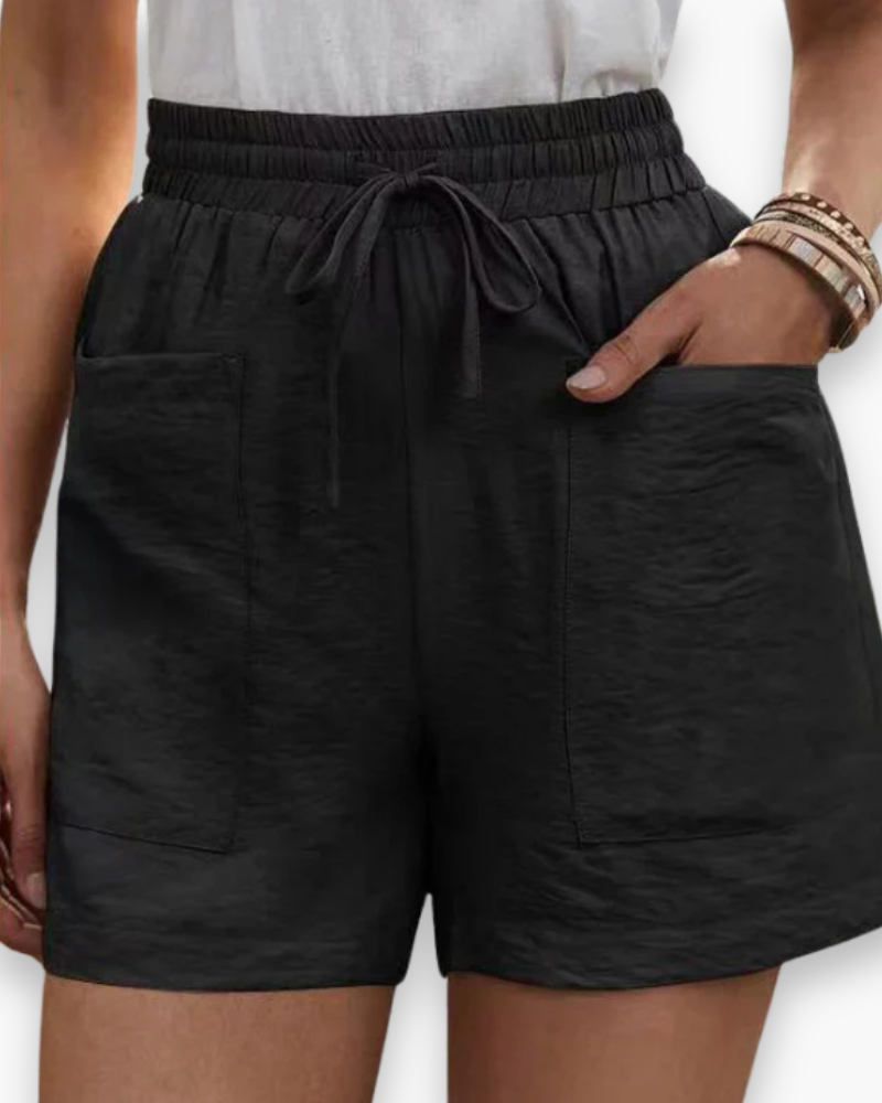Short cargo estival pour femme, tissu léger, ceinture ajustable, poches pratiques, idéal pour un style décontracté.