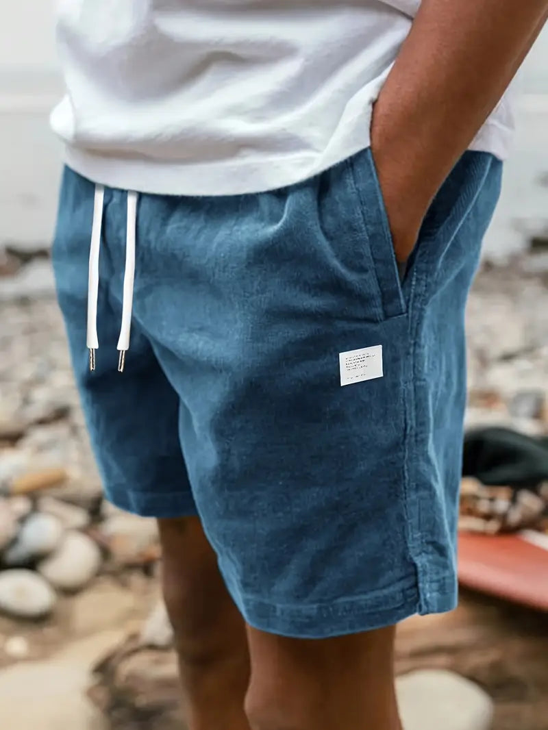 Short décontracté bleu pour hommes, idéal pour le confort estival et un look mode décontracté.