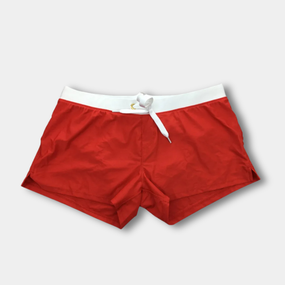 Short de bain homme ajusté, taille contrastée. Coupe élégante et confortable.