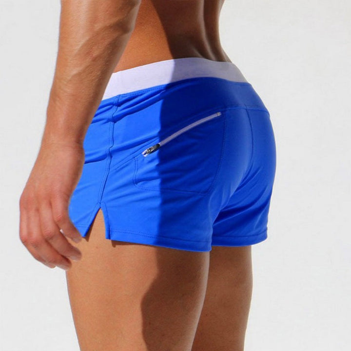 "Short de bain homme confortable, séchage rapide, design urbain élégant, tissu élastique pour liberté de mouvement."