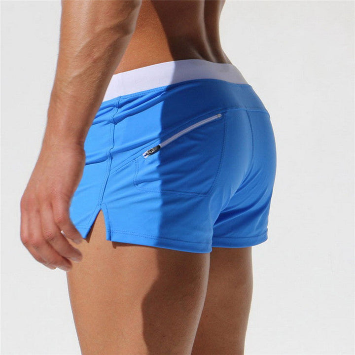 "Short de bain homme confortable, séchage rapide, design urbain élégant, tissu élastique pour liberté de mouvement."