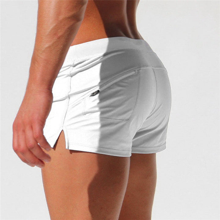"Short de bain homme confortable, séchage rapide, design urbain élégant, tissu élastique pour liberté de mouvement."