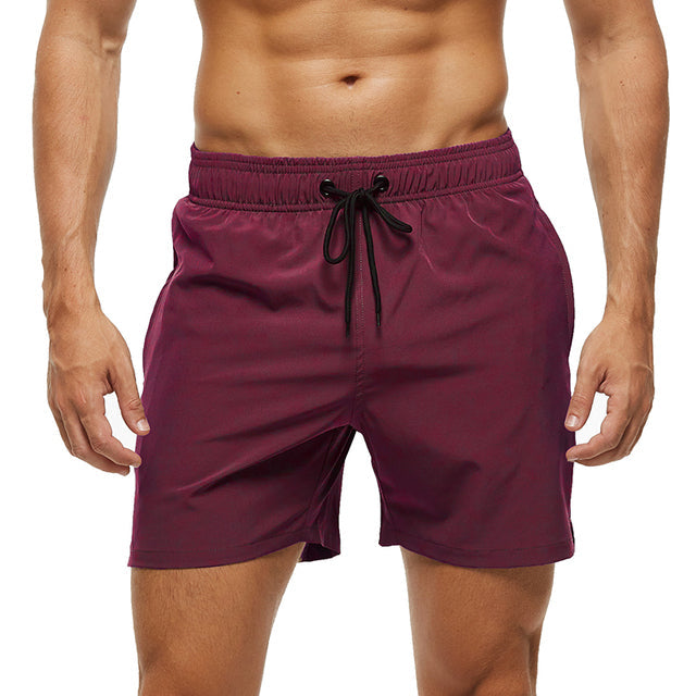 Short de sport homme en tissu technique respirant, coupe athlétique, parfait pour le running et le confort quotidien.