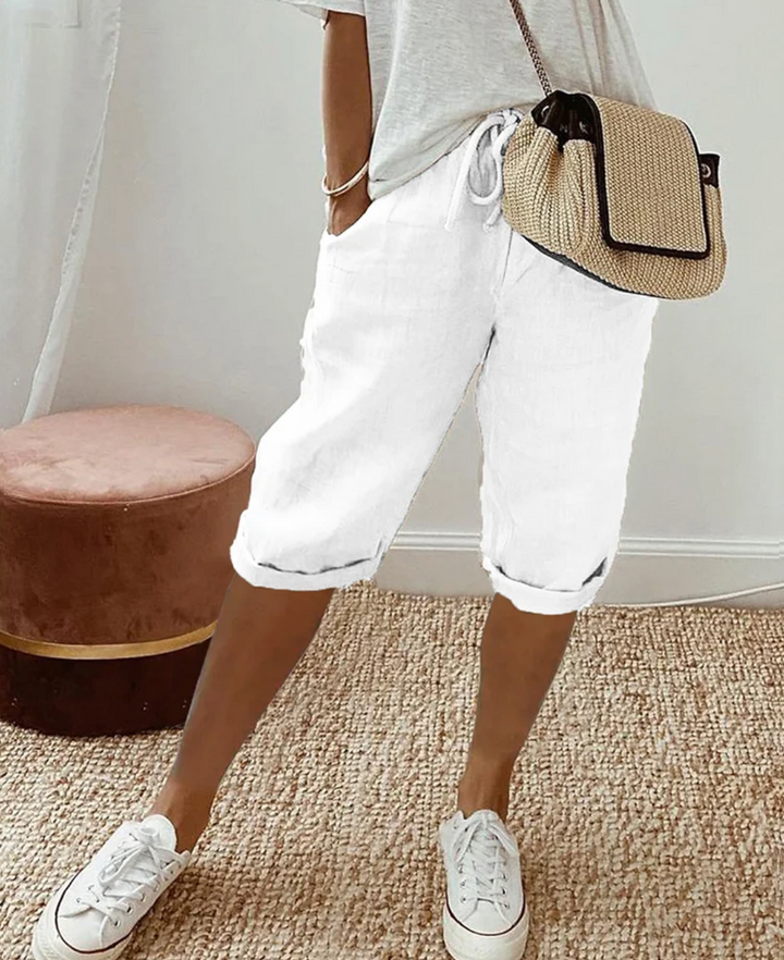 Short en lin élégant Miranda pour femme, confortable et chic, parfait pour l'été avec des détails raffinés.