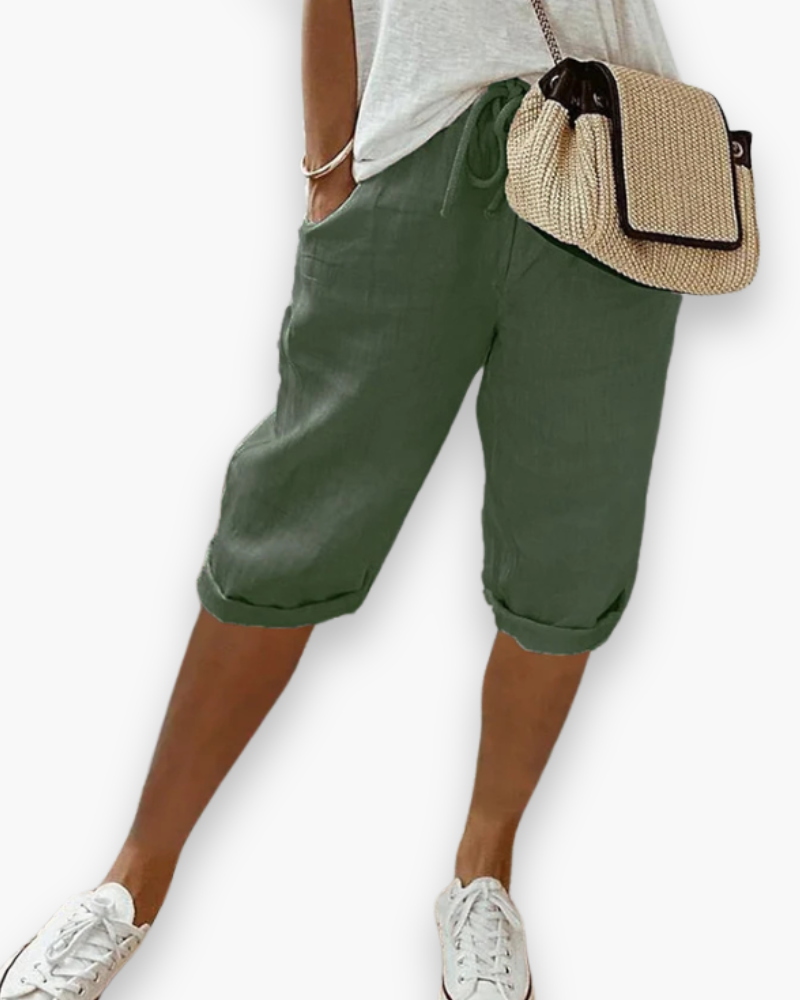 "Short femme confortable et respirant, style décontracté, tissu léger, disponible en plusieurs couleurs, idéal pour l'été."