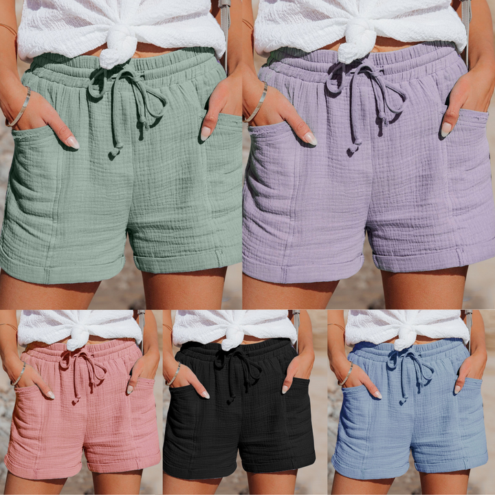 Short femme décontracté mais chic, tissu doux et coupe moderne pour un confort estival optimal.