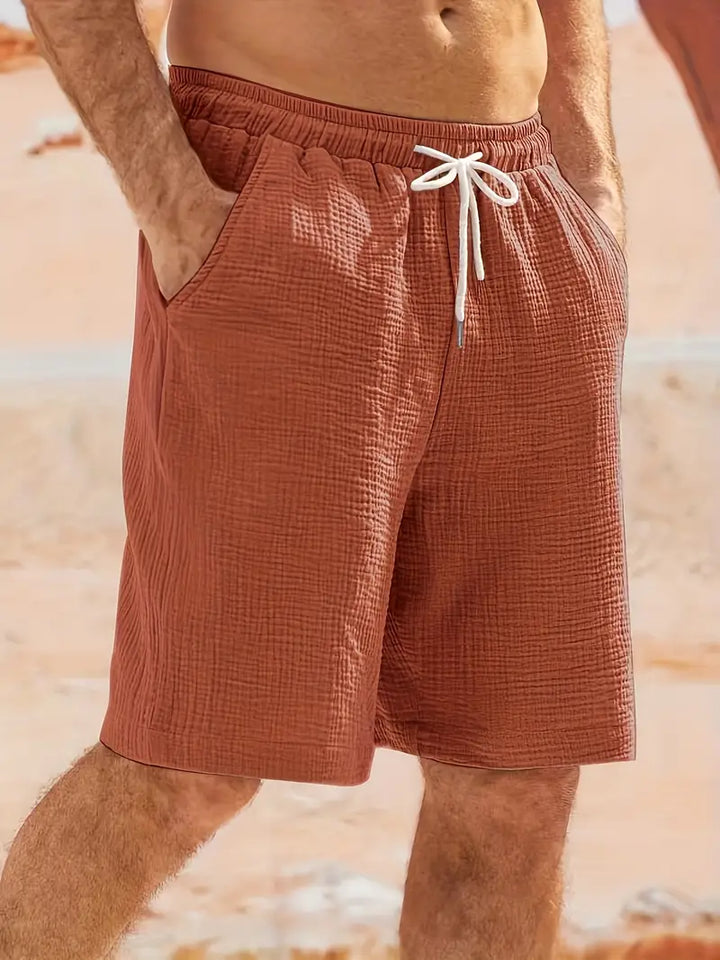 Shorts homme décontractés été, tissu respirant, coupe ample, disponibles en couleurs tendance pour activités extérieures.