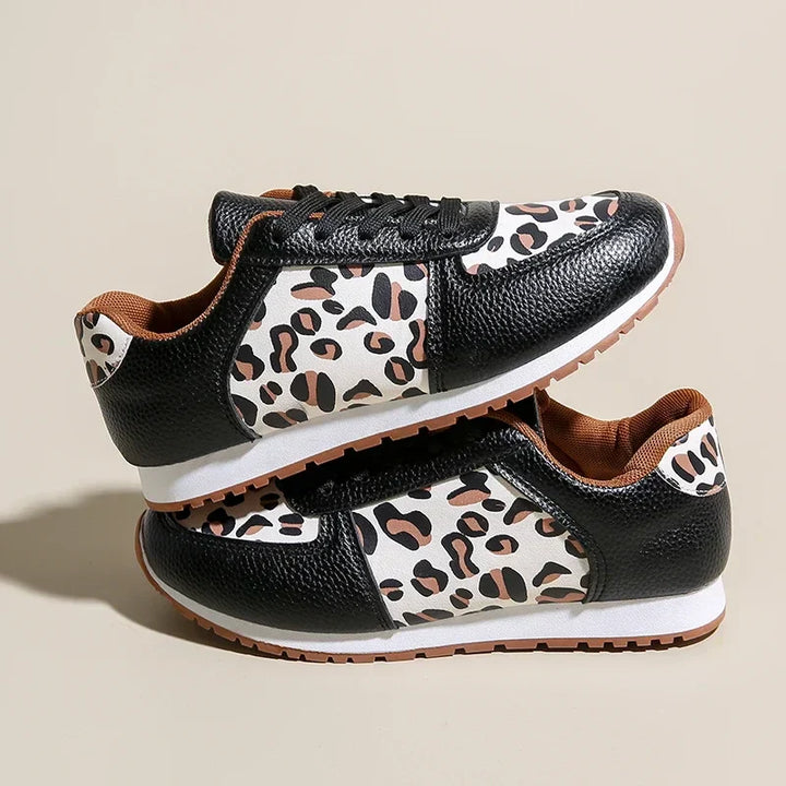 Chaussure sneaker femme tendance motif léopard, idéale pour un look sport chic en ville avec amorti.