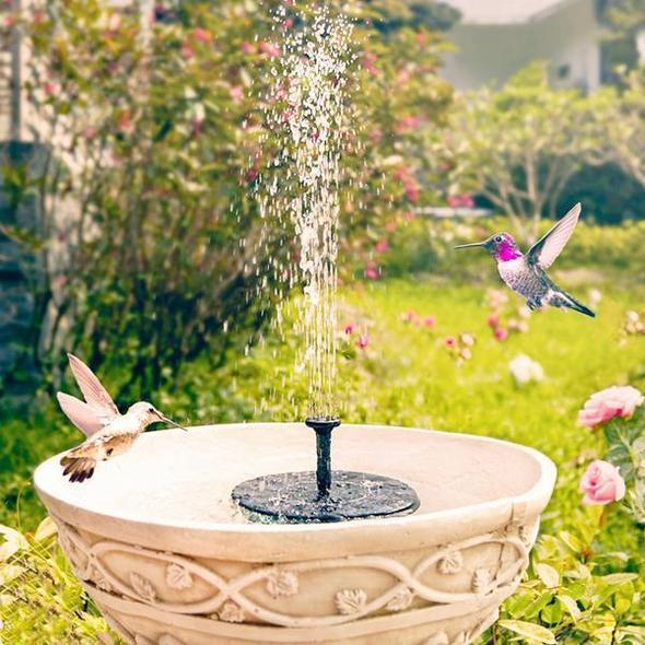 Solar-powered mini garden fountain. Elegant design, attracts birds. Easy installation, eco-friendly.
