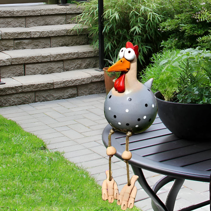 Statue poule résine, grands yeux, déco jardin, style unique.