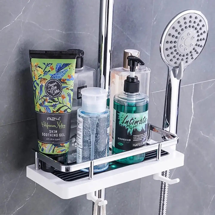 "Support de douche universel moderne blanc avec étagères et design auto-drainant, idéal pour le rangement optimal en salle de