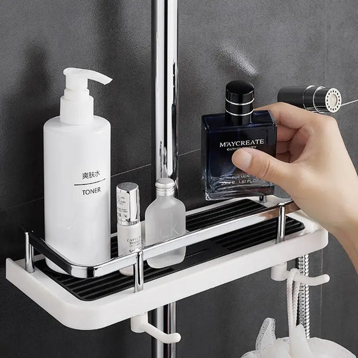"Support de douche universel moderne blanc avec étagères et design auto-drainant, idéal pour le rangement optimal en salle de