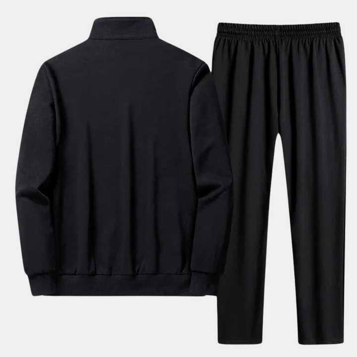 Survêtement homme complet zippé. Ensemble sport athlétique avec veste et jogger confortable.