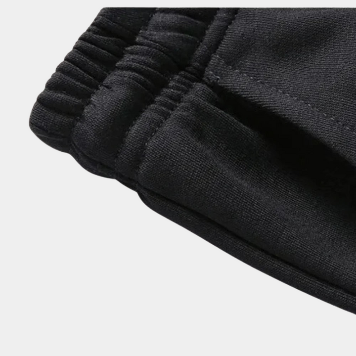 Jogger confortable pour homme en tissu doux, pantalon de survêtement. Parfait pour le jogging et la détente.