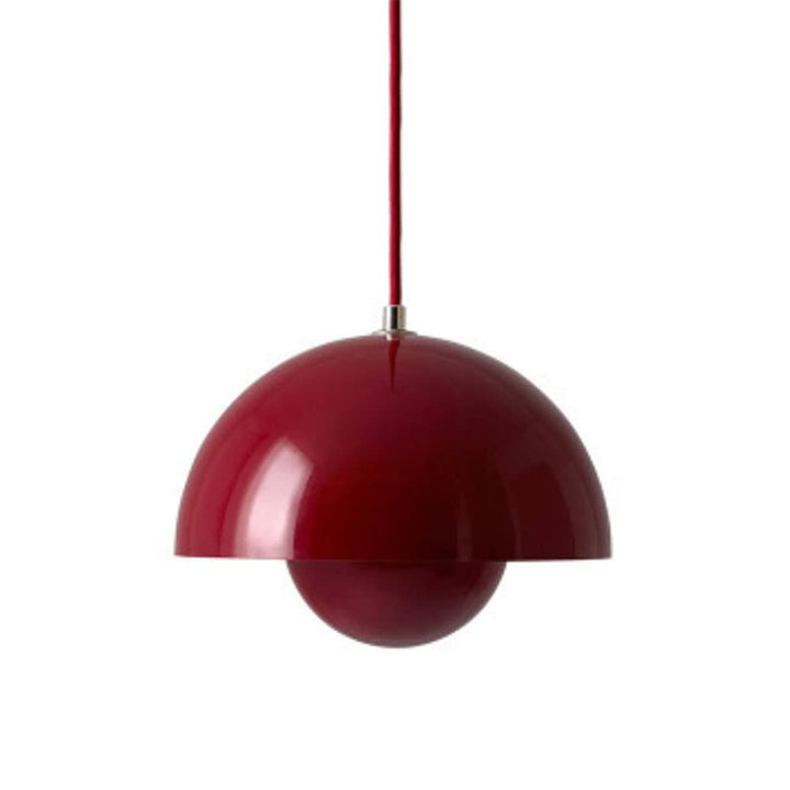 Suspension design élégante, éclairage chaud et tamisé. Luminaire moderne pour salon, chambre ou salle à manger.