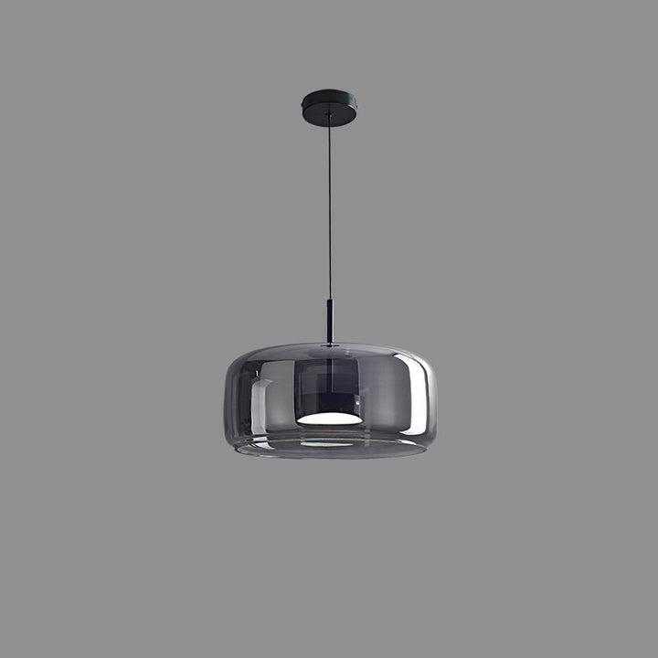 Suspension lumineuse en verre soufflé, design élégant et moderne.  Luminaire intérieur, forme tambour, ambiance chaleureuse.