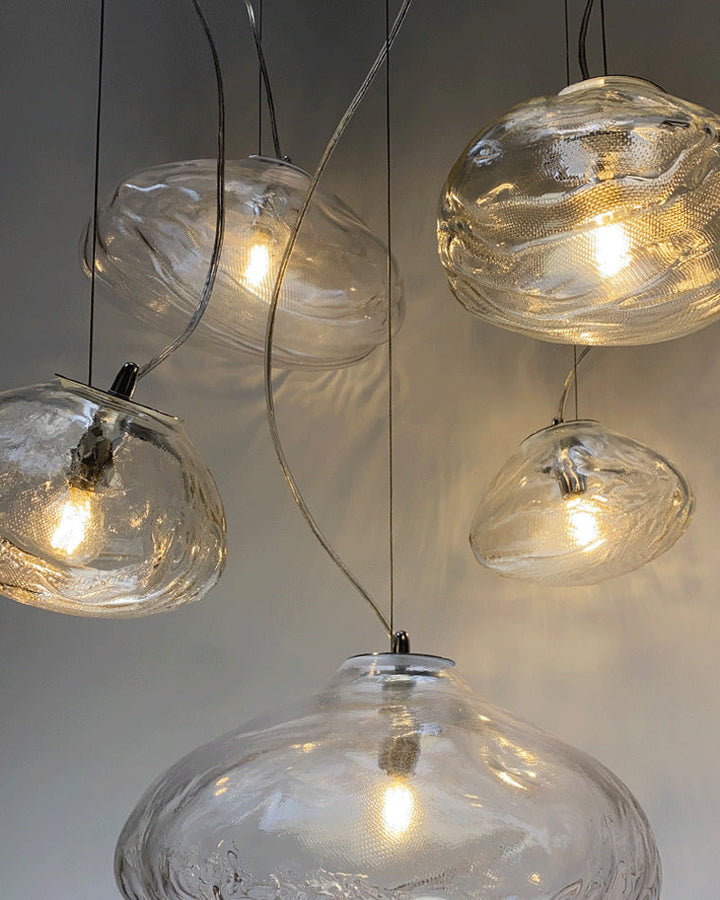 Suspension nuage en verre soufflé, éclairage design, luminaire élégant et aérien.