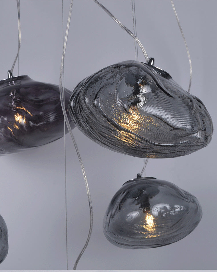 Suspension nuage en verre soufflé, éclairage design, luminaire élégant et aérien.