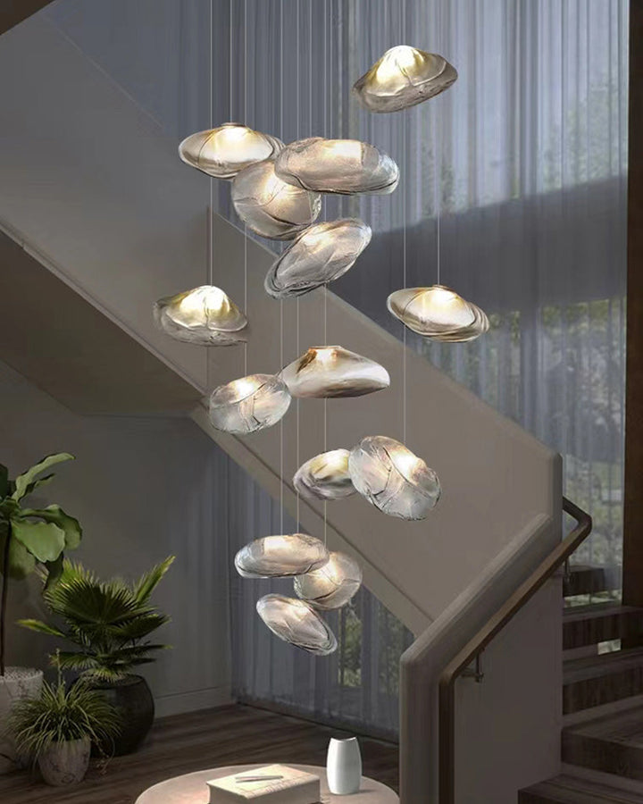 Suspension nuage en verre soufflé, éclairage design, luminaire élégant et aérien.