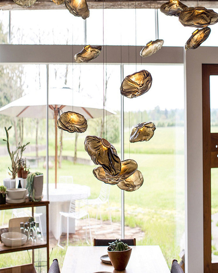 Suspension nuage en verre soufflé, éclairage design, luminaire élégant et aérien.