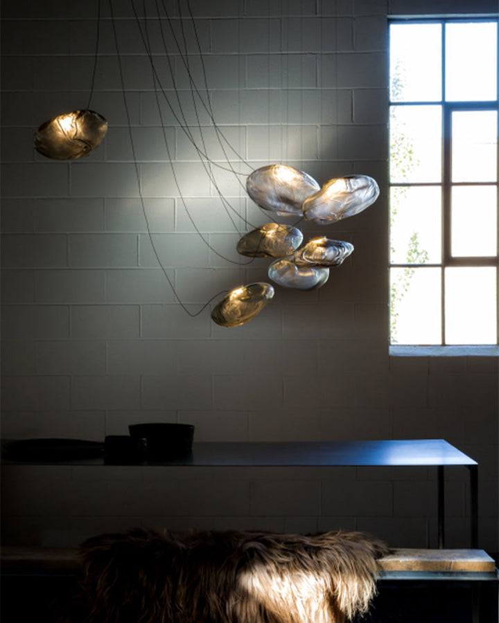 Suspension nuage en verre soufflé, éclairage design, luminaire élégant et aérien.