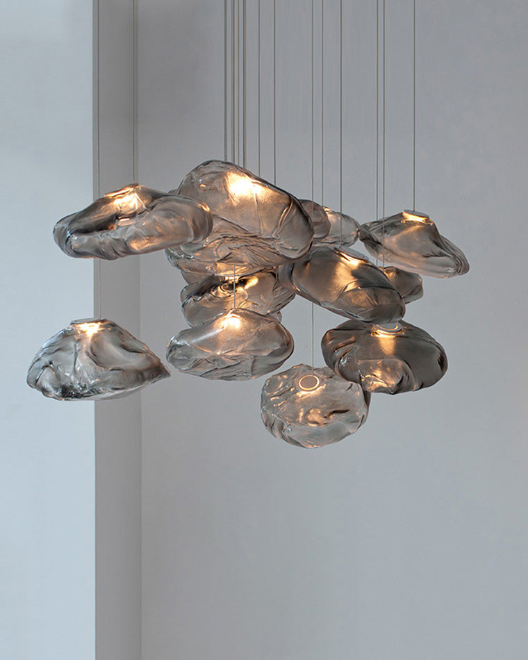 Suspension nuage en verre soufflé, éclairage design, luminaire élégant et aérien.