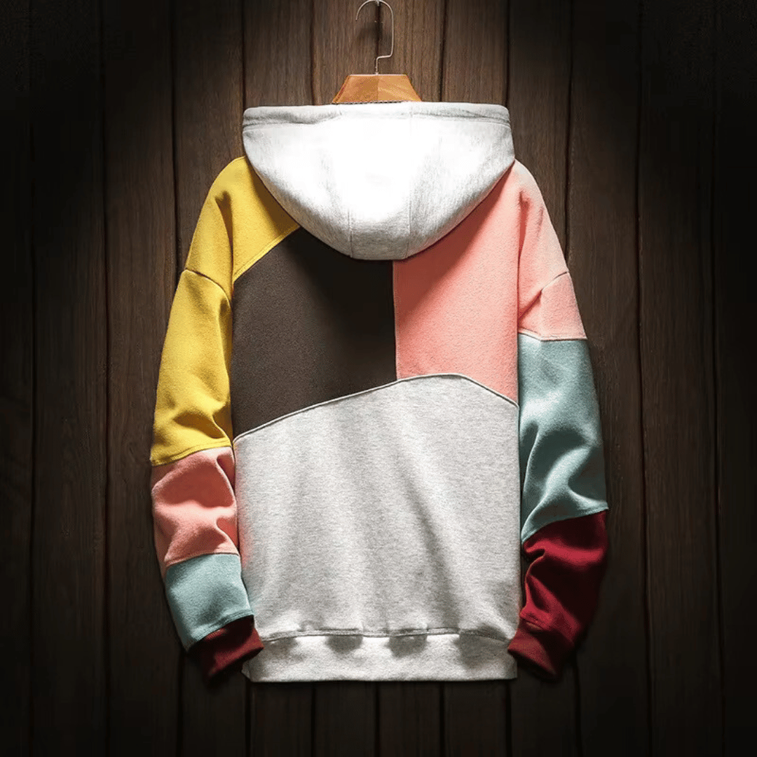 Pull à capuche homme moderne et coloré. Confort ultime pour une mode masculine tendance et urbaine.