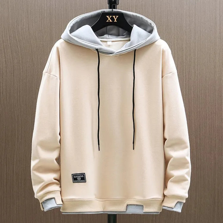 Hoodie homme gris décontracté, idéal pour un style urbain polyvalent en hiver. Tissu confortable et de qualité.