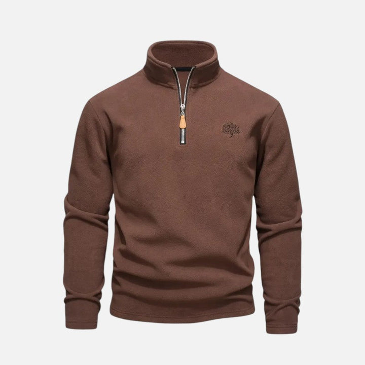 "Sweat-shirt homme à col montant zippé, coupe décontractée, tissu doux beige, idéal pour un style moderne et confortable."