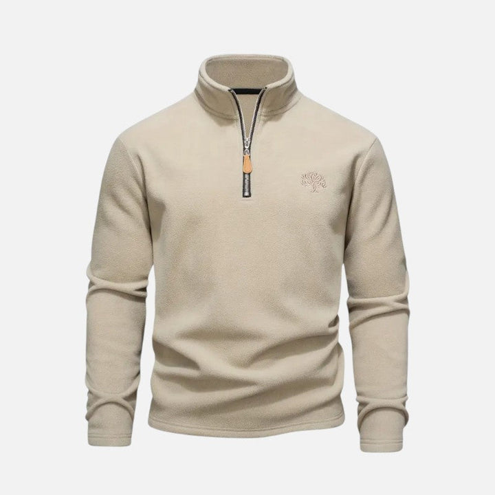 "Sweat-shirt homme à col montant zippé, coupe décontractée, tissu doux beige, idéal pour un style moderne et confortable."