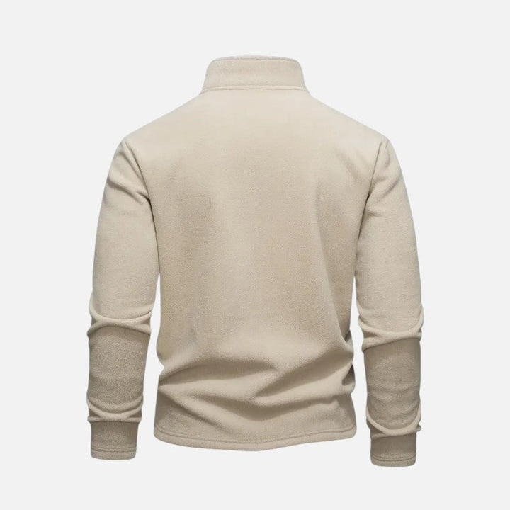 "Sweat-shirt homme à col montant zippé, coupe décontractée, tissu doux beige, idéal pour un style moderne et confortable."