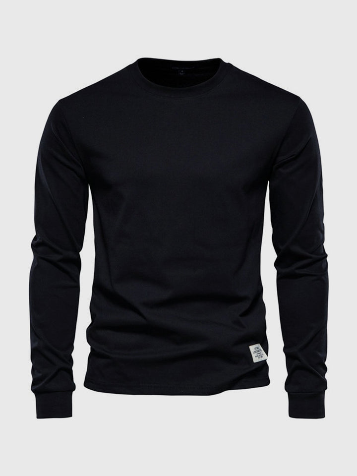 T-shirt basique homme manches longues col rond, idéal pour un look casual ou sous une veste.