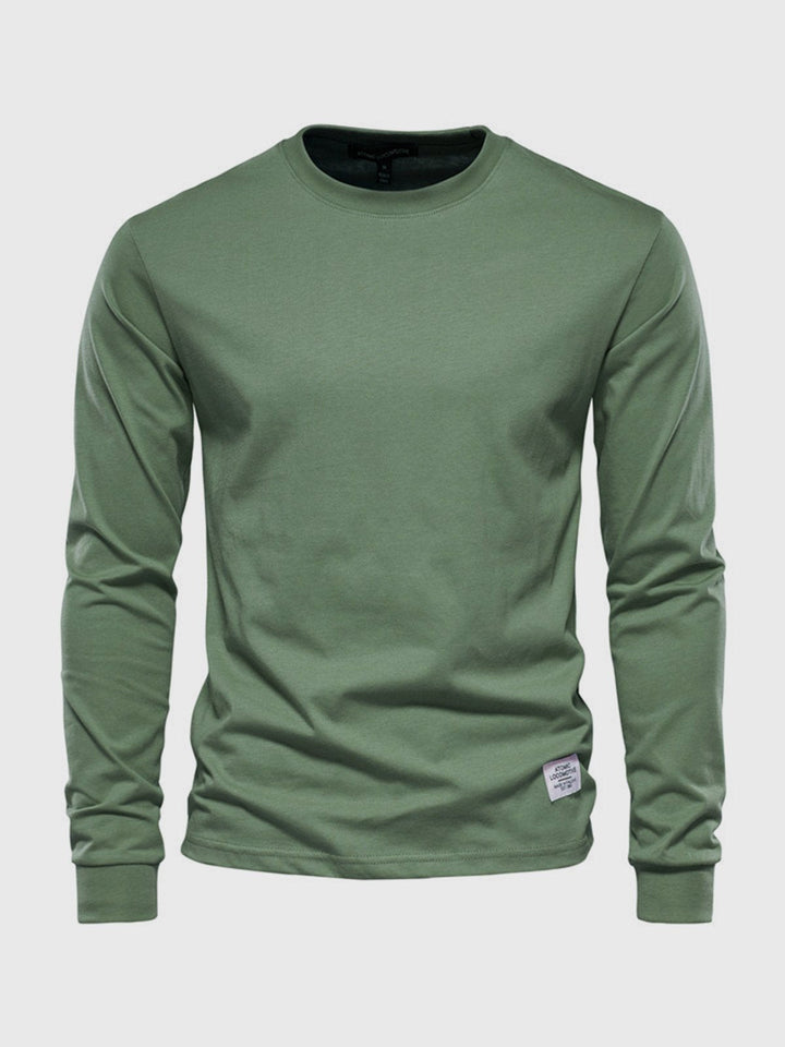 T-shirt casual homme à manches longues et col rond, essentiel pour une tenue décontractée et tendance.