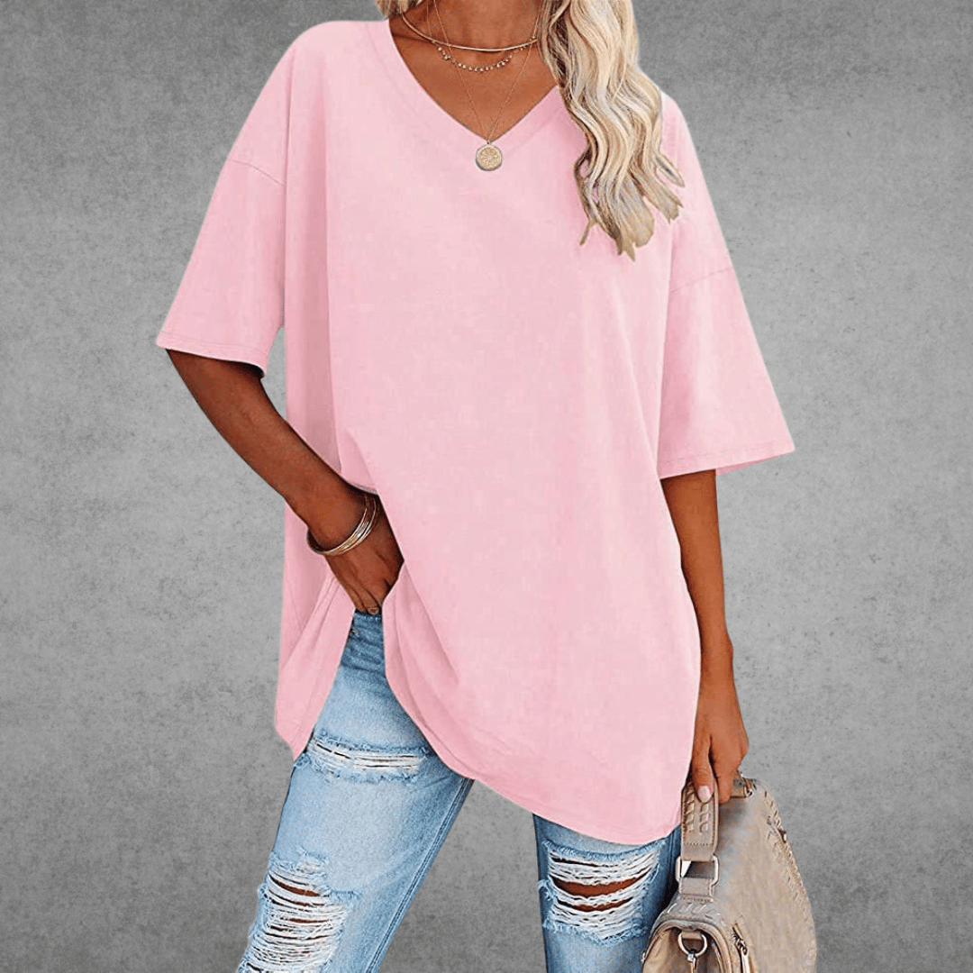 T-shirt femme ample à col V, matière respirante, coupe décontractée pour l'été.